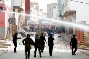 Moroccan police fire a water cannon at protesters demonstrating against alleged corruption in the provincial town of Imzouren, Morocco, June 2, 2017. Mouhcine Fikri's death has become a symbol for frustrations over official abuses and revived the spirit of the February 20 movement that spearheaded pro-democracy rallies in 2011 and prompted King Mohammed VI to cede some of his powers. REUTERS/Youssef Boudlal